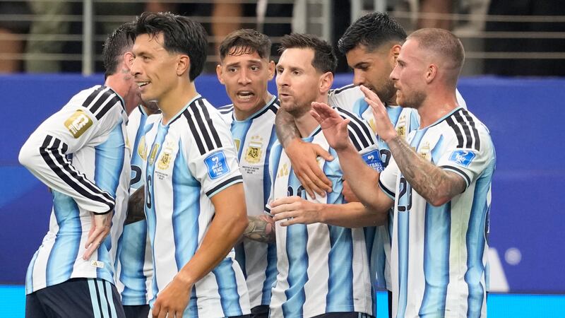 Messi sets World Cup scoring record as defending champion Argentina advances to knockout stage